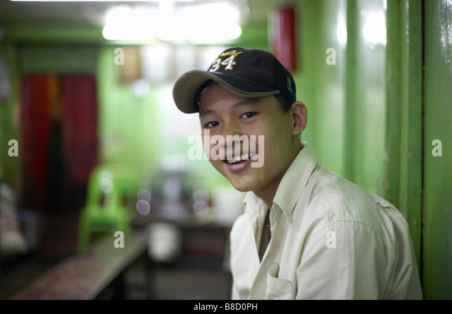 Young Man Smiling, Yangon, Myanmar (Burma) Stock Photo