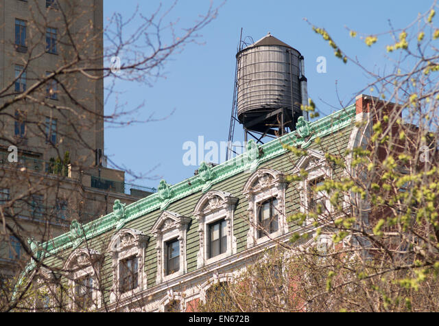old-water-tower-above-a-building-at-the-