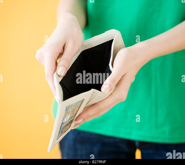 woman-holding-open-empty-wallet-b27rnp.j