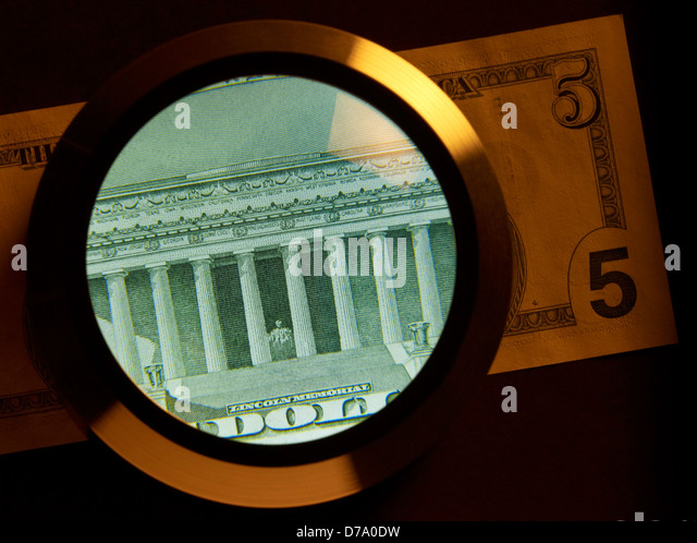 detail-of-a-five-dollar-note-and-magnify