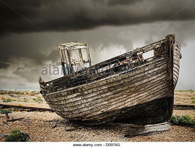 a-wooden-fishing-boat-on-the-beach-at-du