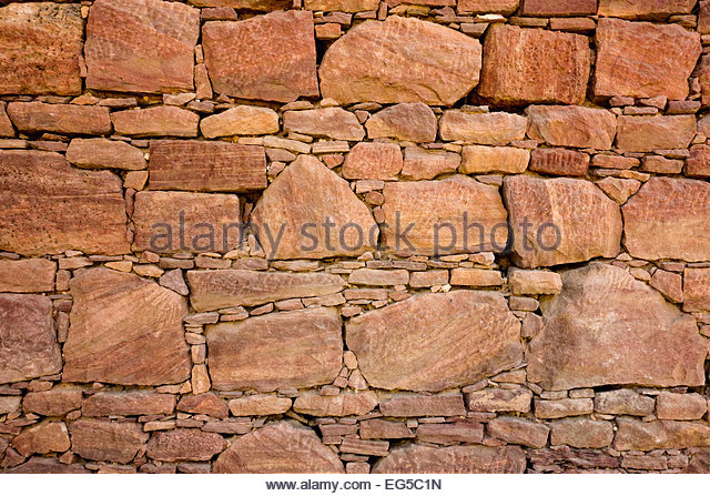 wall-made-of-interlocking-dry-stones-wit