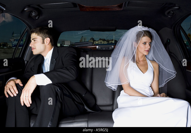 close-up-of-a-newlywed-couple-sitting-in