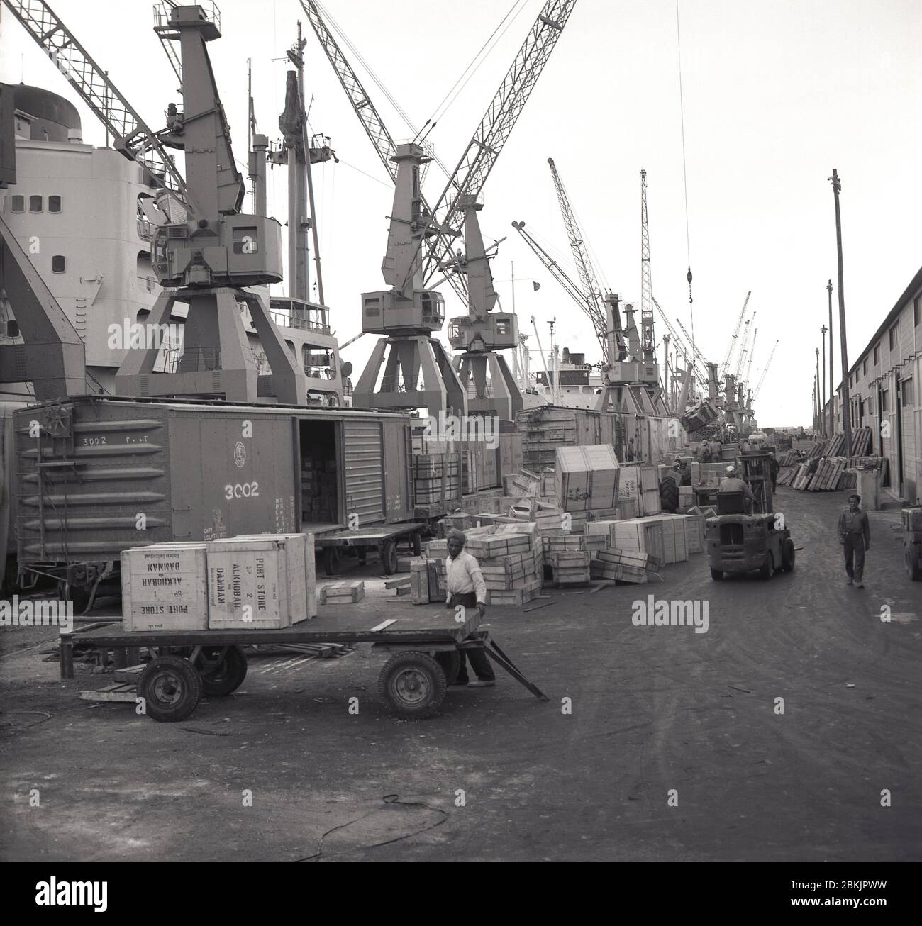 1960s, historical, activity, docks, Dammam, Saudi Arabia, freight being ...