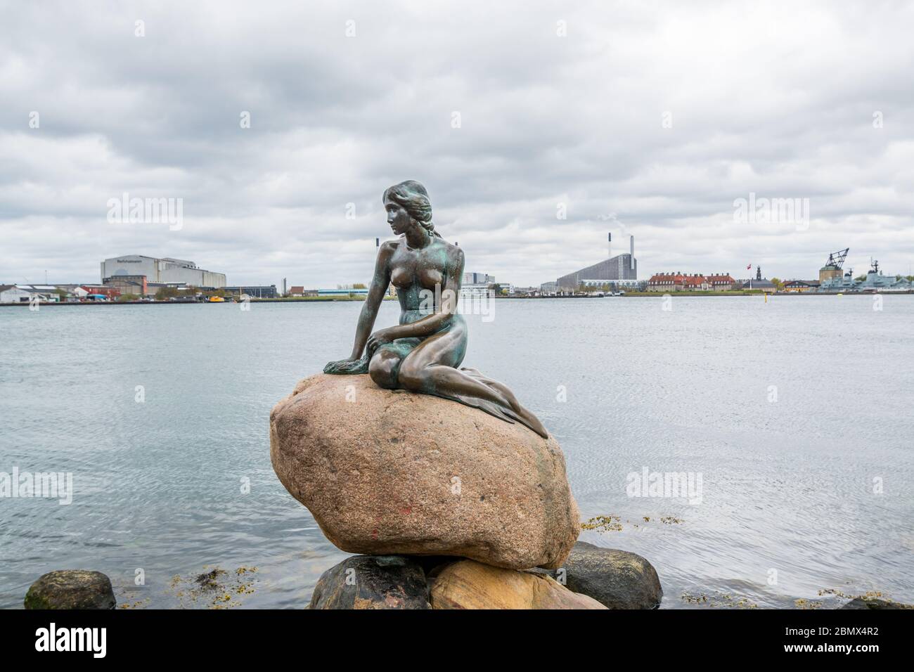 The Little Mermaid statue by Edvard Eriksen, displayed on a rock by the ...