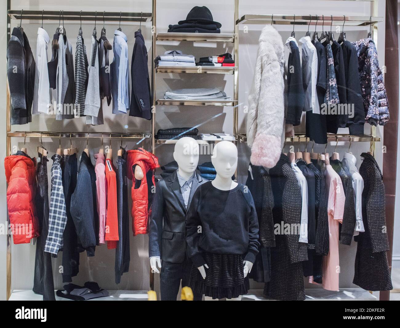 Children clothing in a shop - shopping mall concept Stock Photo - Alamy