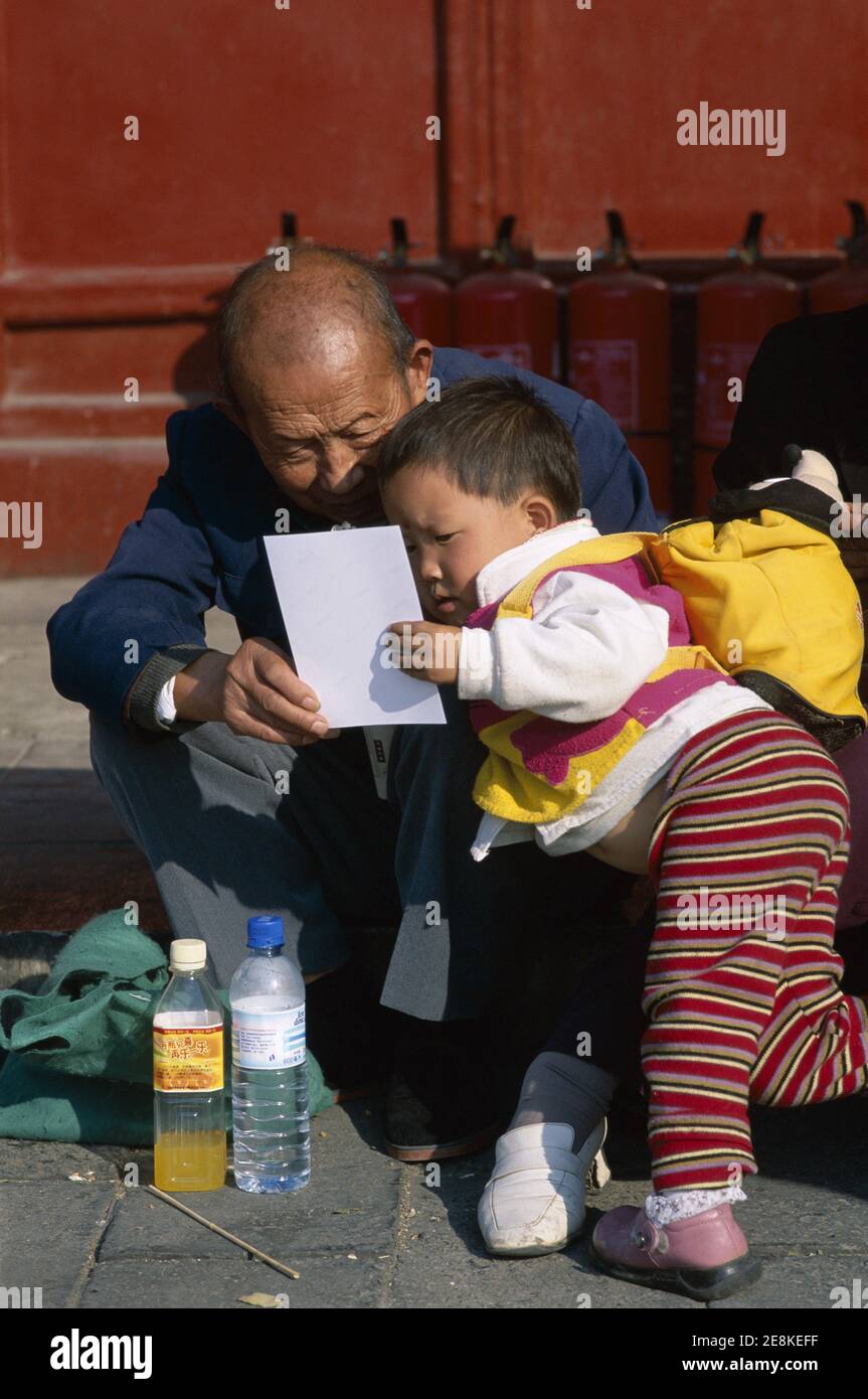 Asia, China, Beijing,, Grandfather with Grandson Stock Photo - Alamy