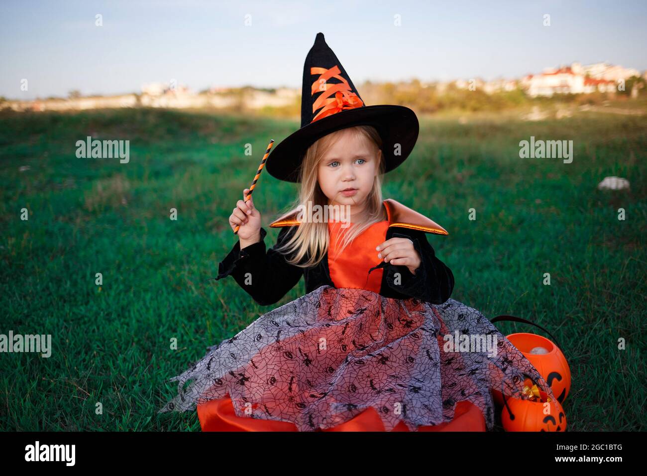 little cute girl dressed as a witch celebrates halloween Stock Photo ...