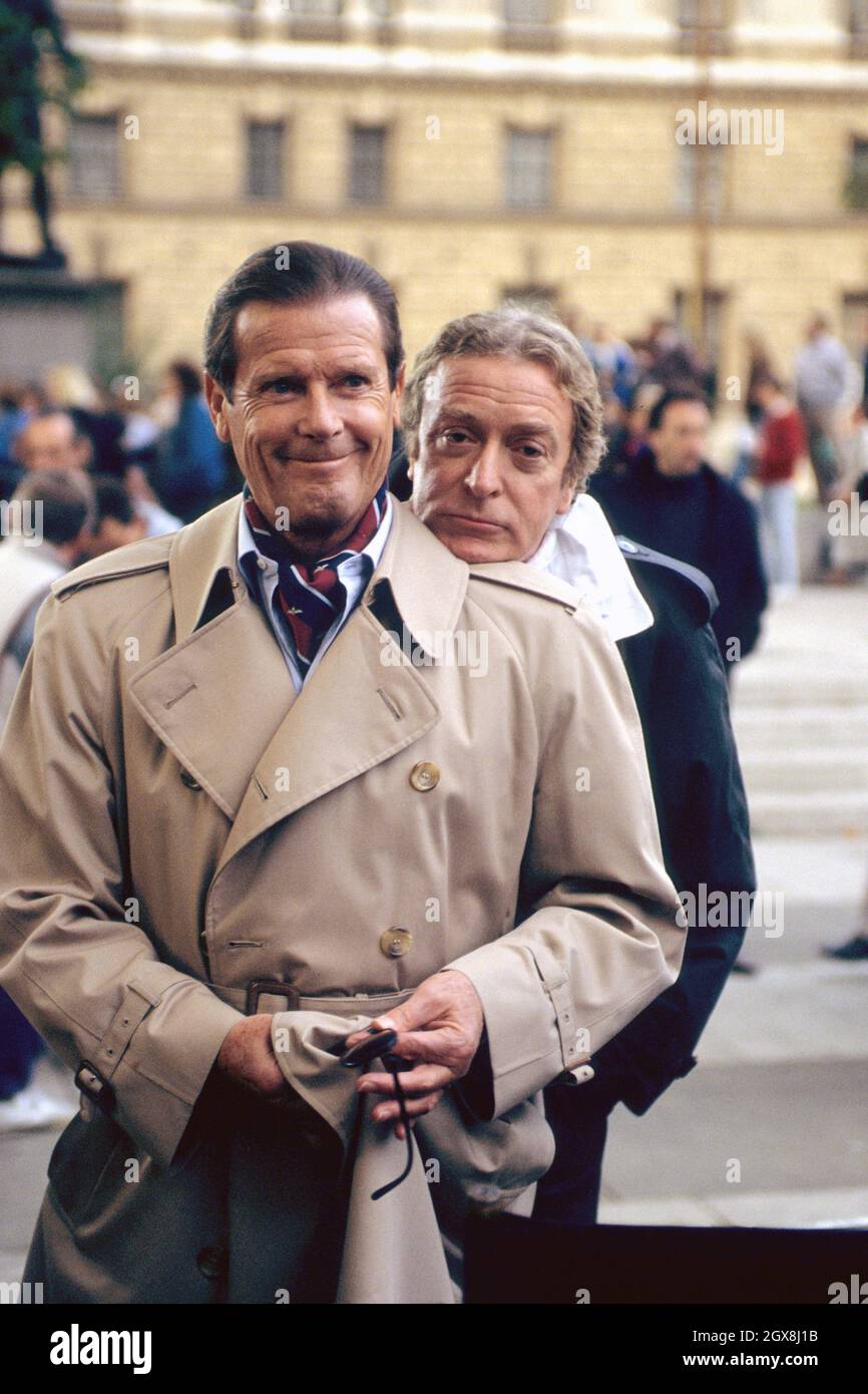 English actors Roger Moore and Michael Caine Stock Photo - Alamy