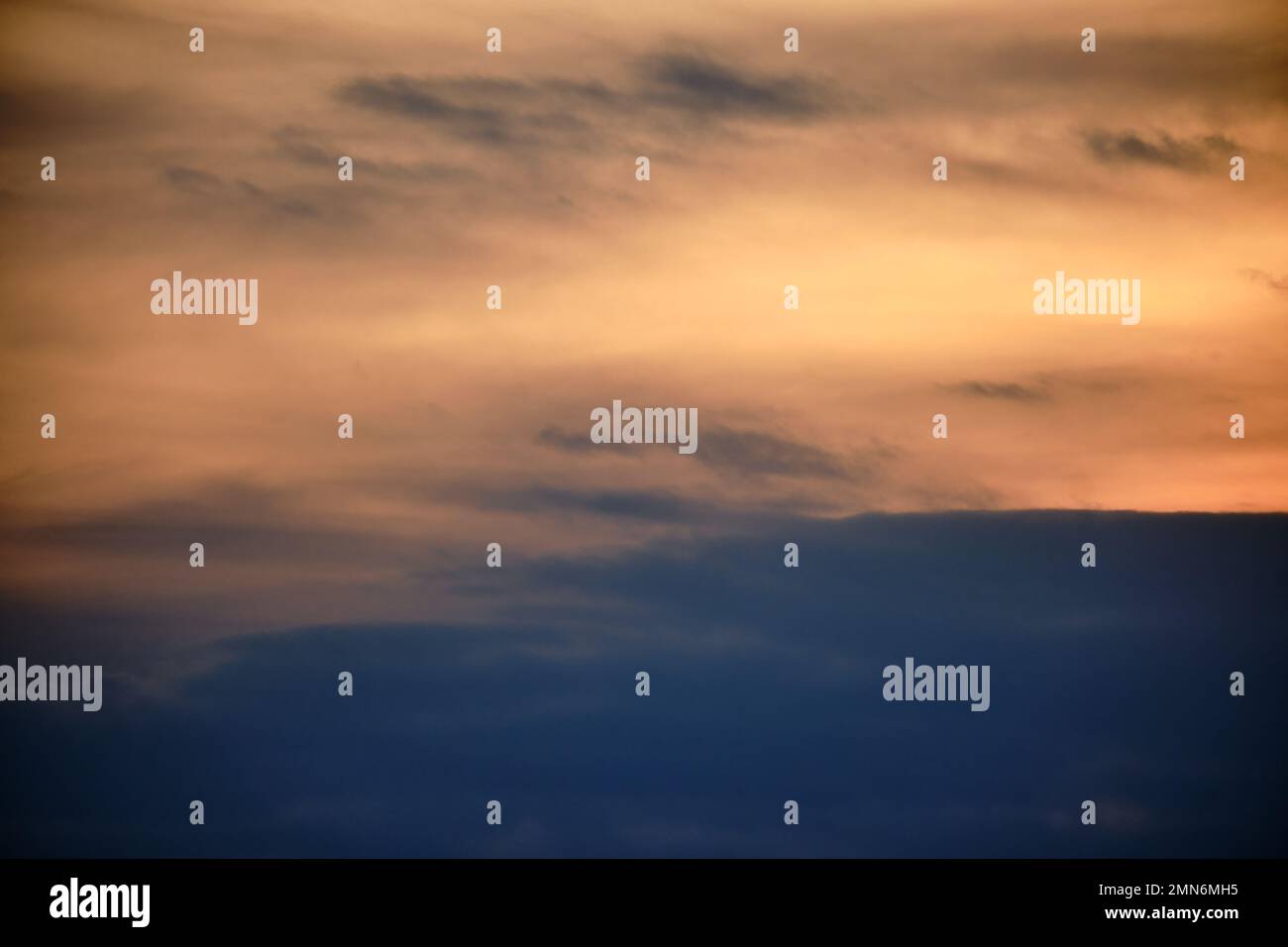 Evening dramatic sky with beige clouds during sunset Stock Photo - Alamy
