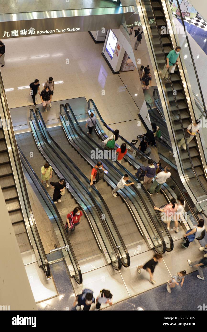 Escalators into Festival Walk Shopping Mall from Kowloon Tong MTR ...