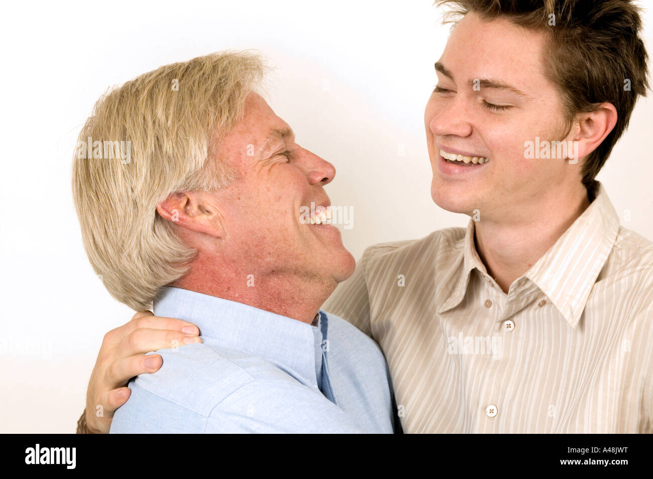 Grandfather And Grandson Smiling Portrait Stock Photo Alamy