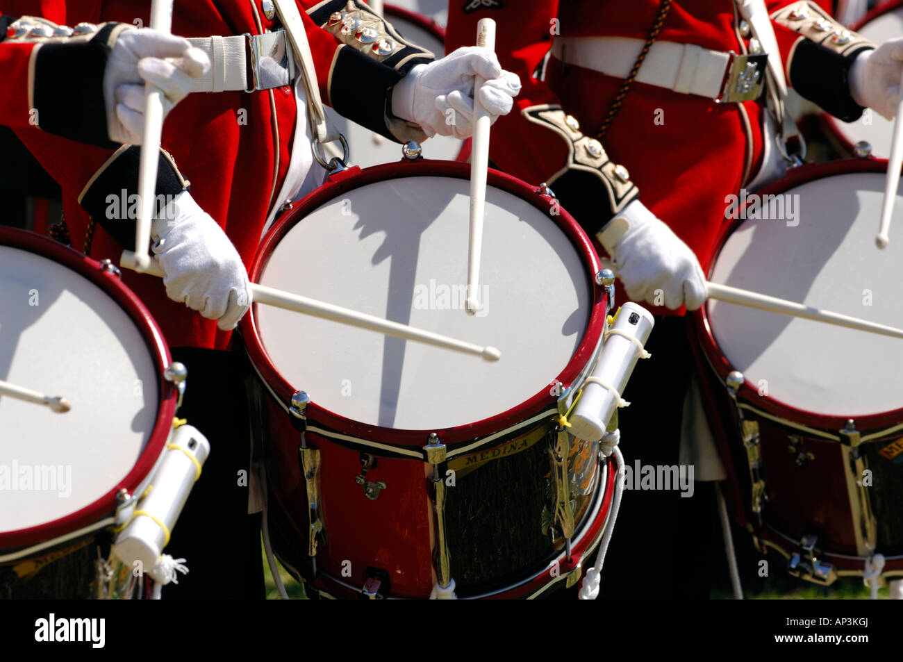 military band drummers beating drums on parade marching smartly