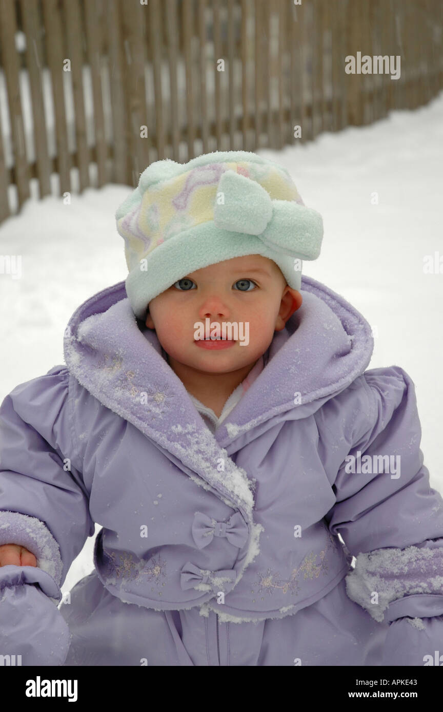 Toddler in a snowsuit Stock Photo - Alamy