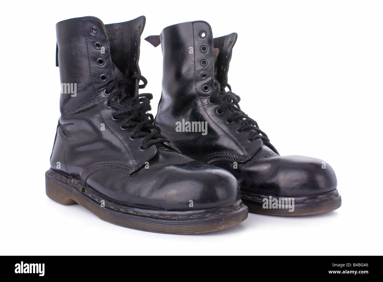 Old black leather work boots isolated on white background Stock Photo ...