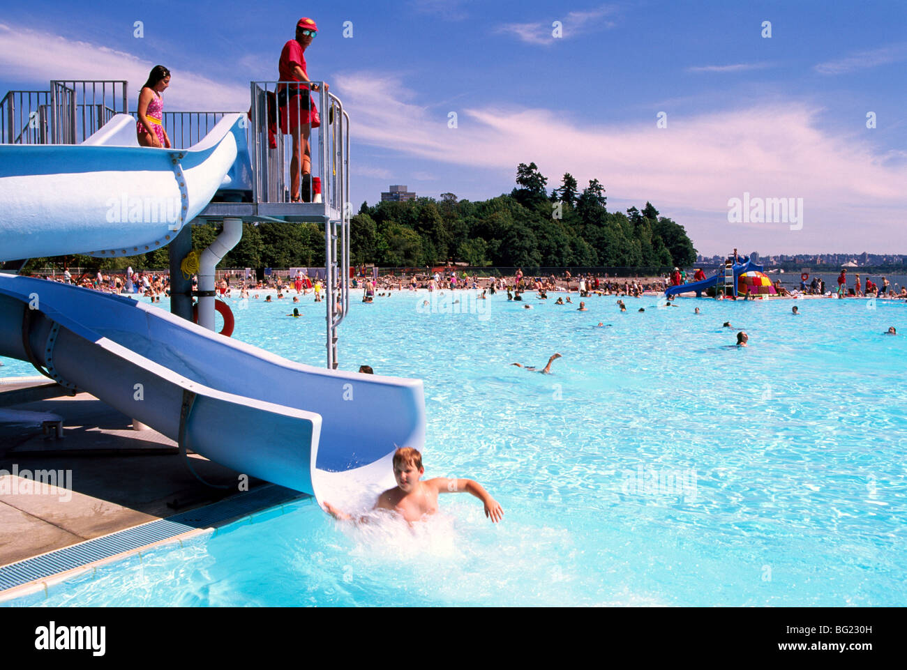 https://www.alamy.com/aggregator-api/download?url=https://c8.alamy.com/comp/BG230H/childrens-water-slide-at-outdoor-swimming-pool-stanley-park-vancouver-BG230H.jpg