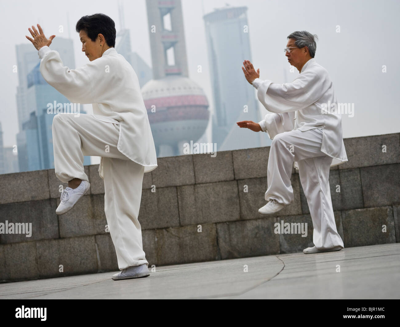 Seniors practicing tai chi Stock Photo - Alamy