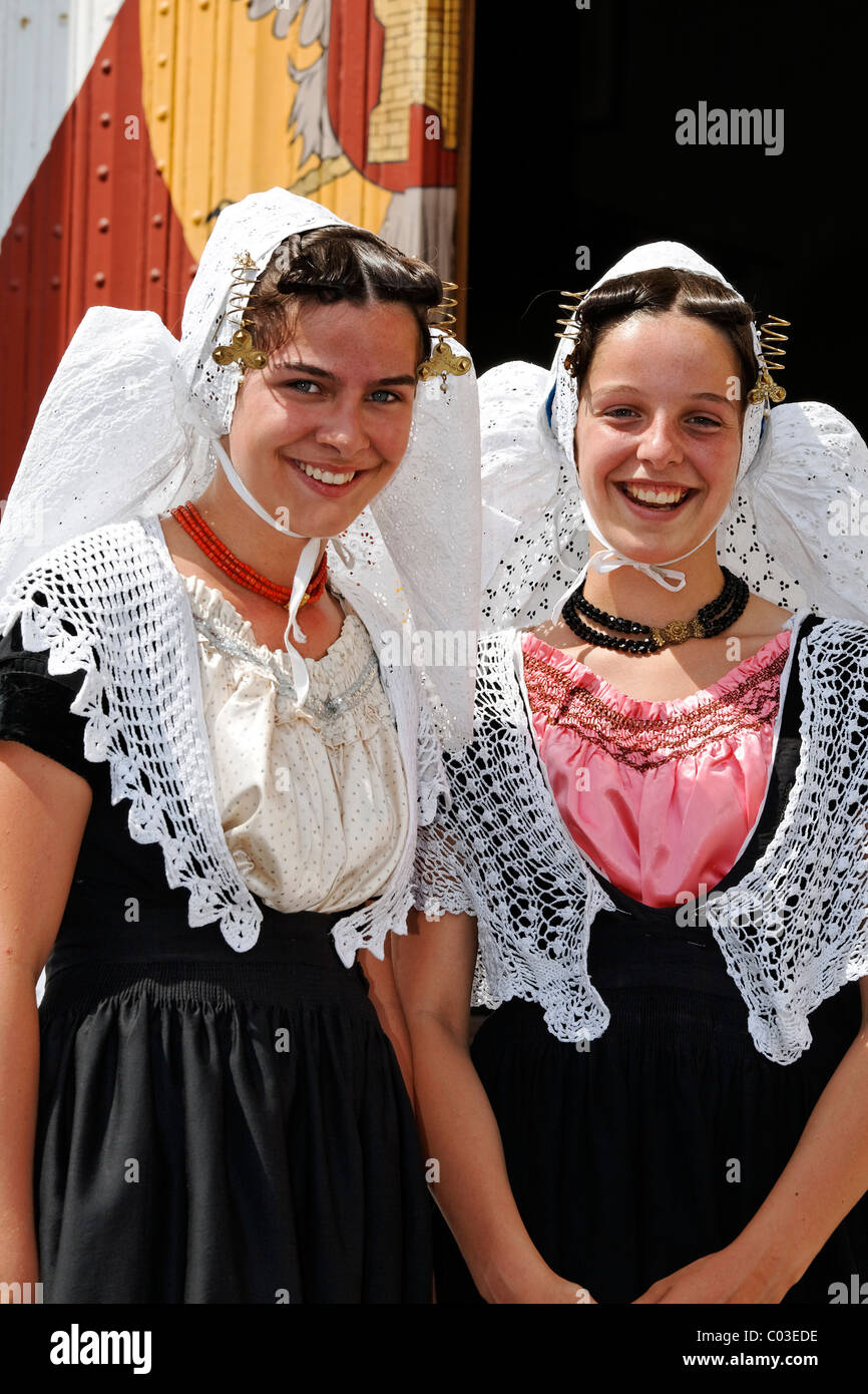 Two young girls wearing traditional costumes of the Zeeland province ...