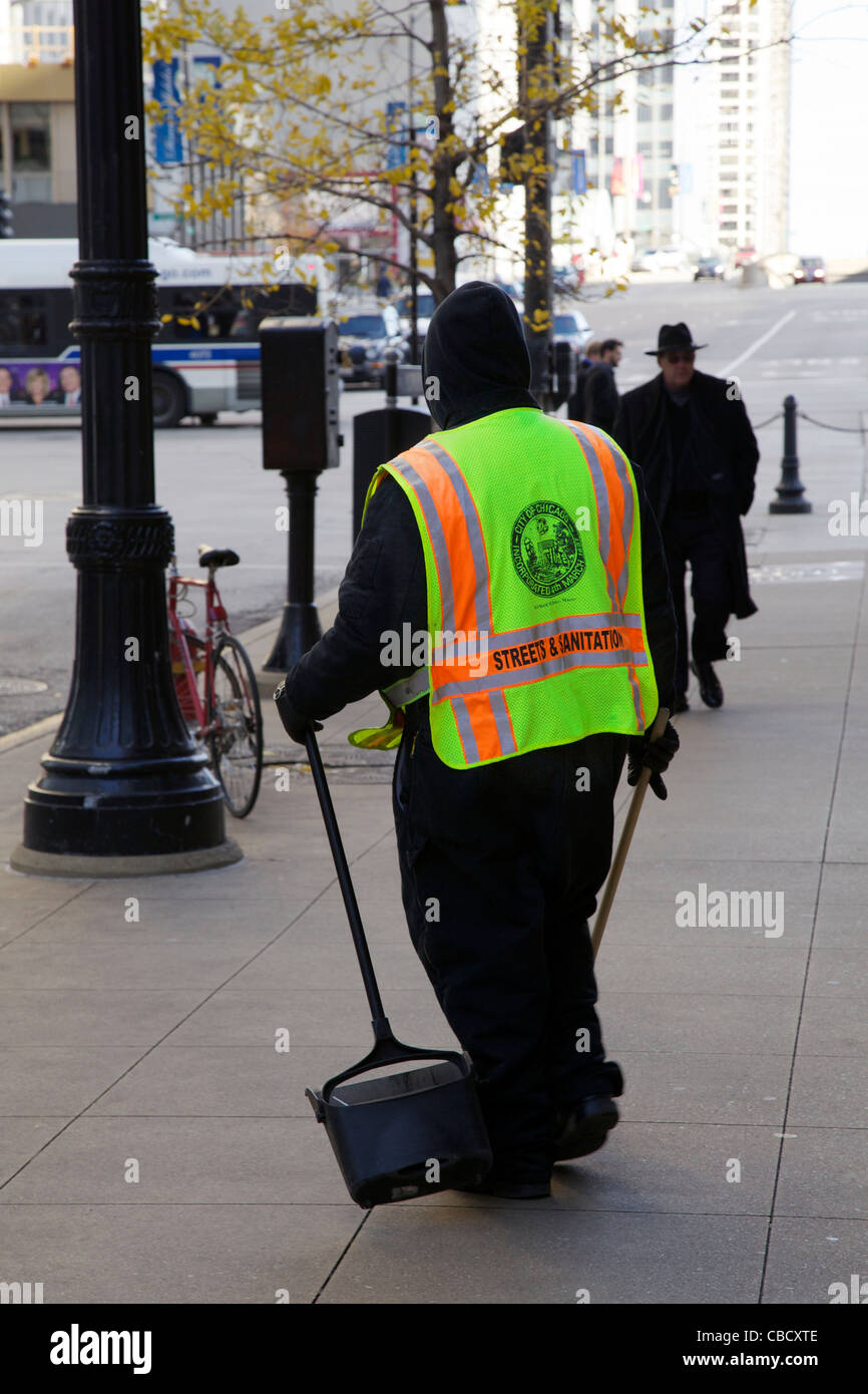 Chicago Streets and Sanitation worker sweeping sidewalk Stock Photo Alamy