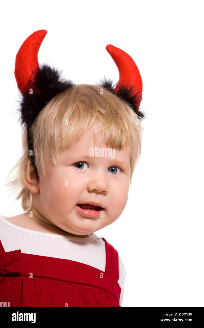 Portrait of little girl wearing devil's horns isolated Stock Photo - Alamy