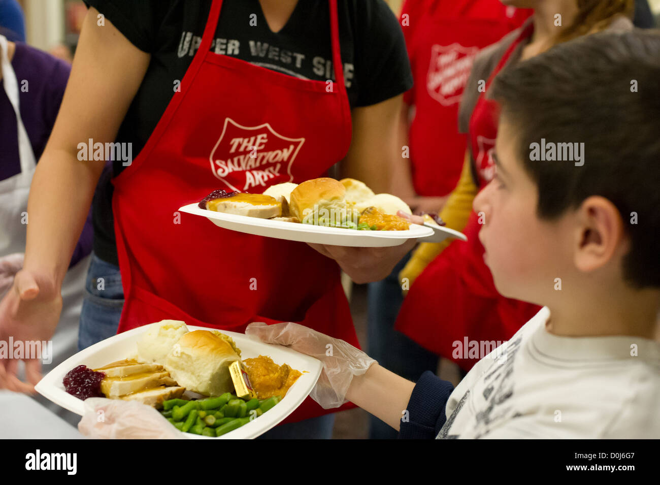 Volunteers for the Salvation Army serve Thanksgiving Dinner to the