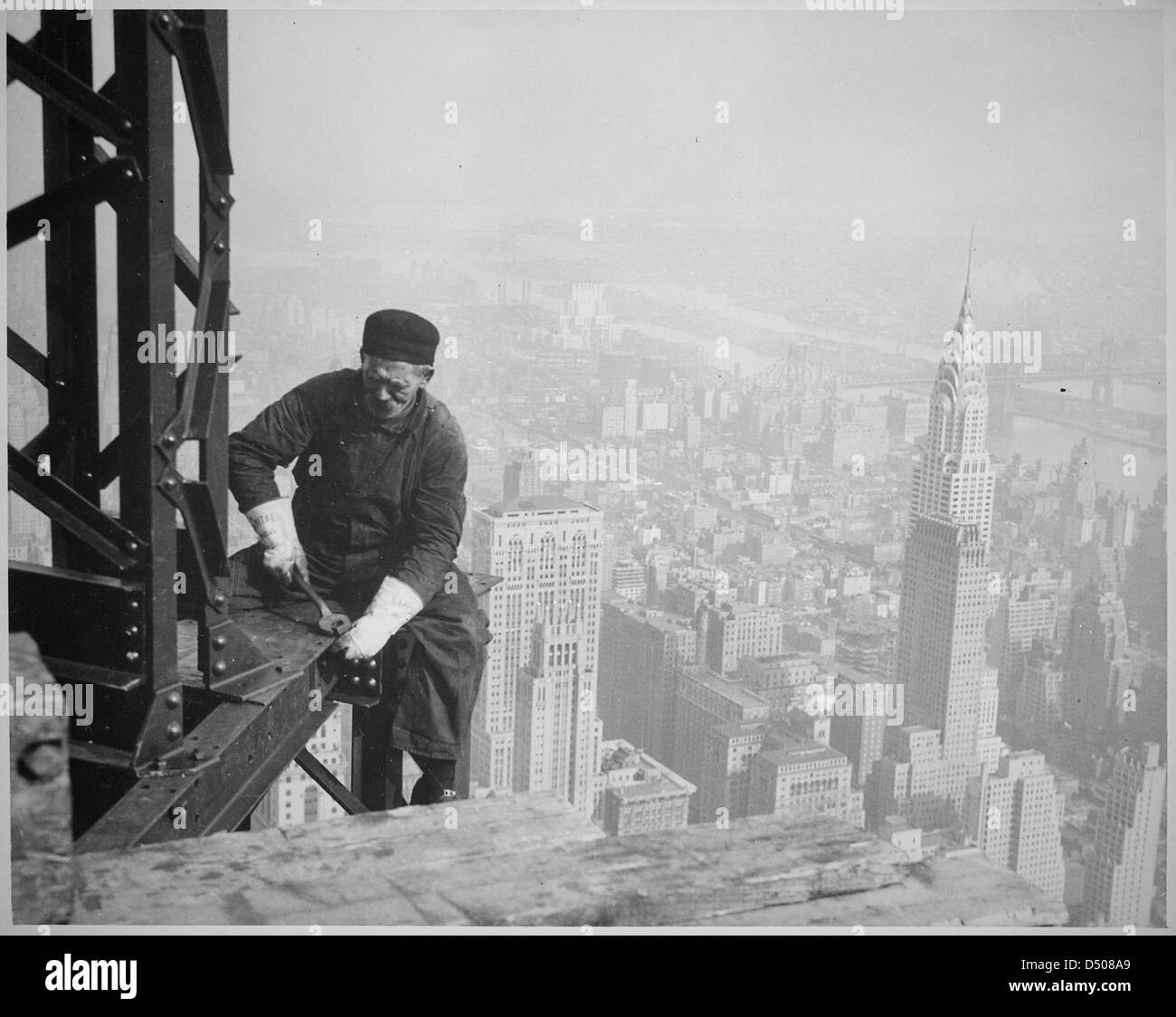 Photograph of a Workman on the Framework of the Empire State Building ...