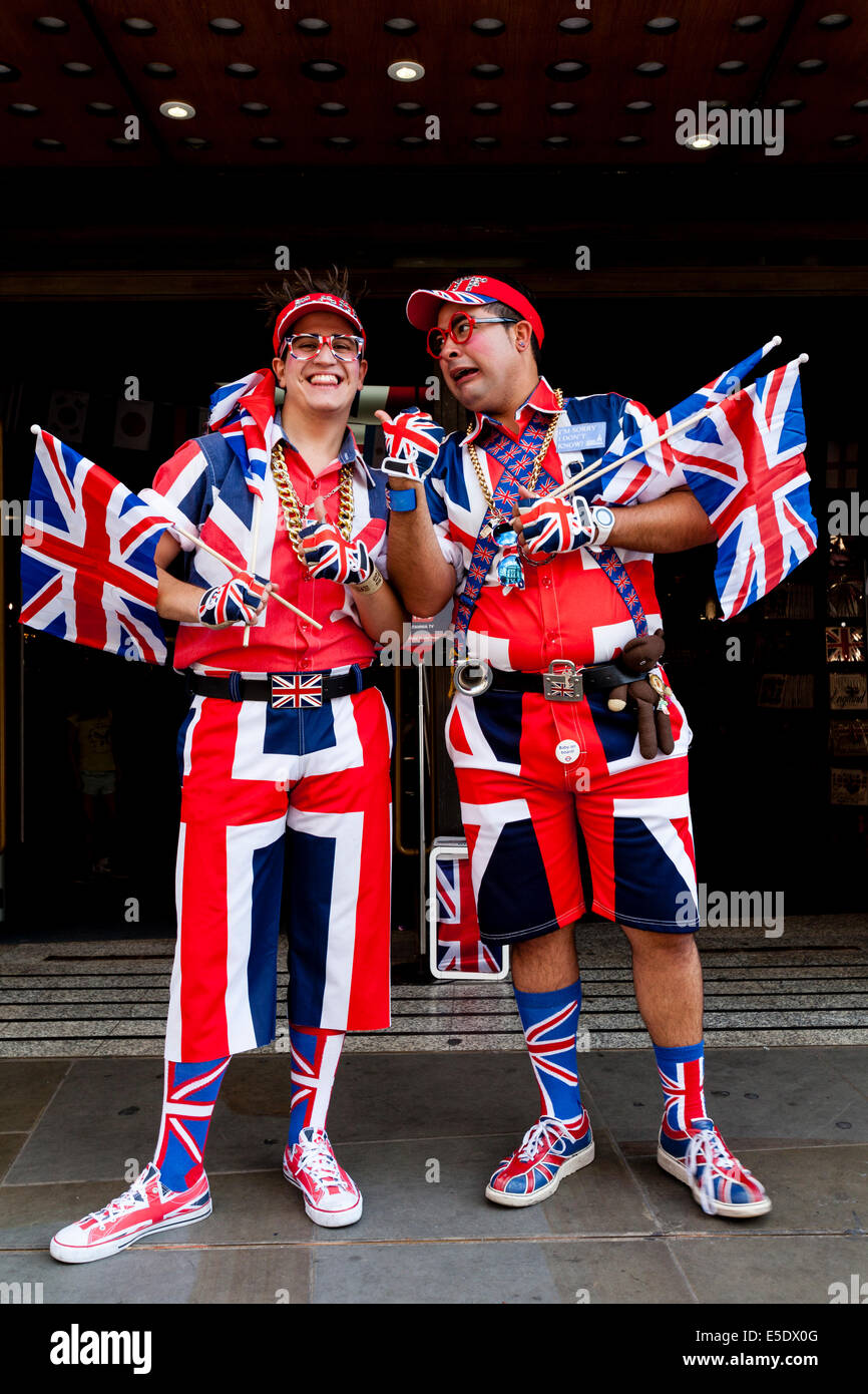 Two Men In Union Jack Costumes Standing Outside The Cool Britannia ...