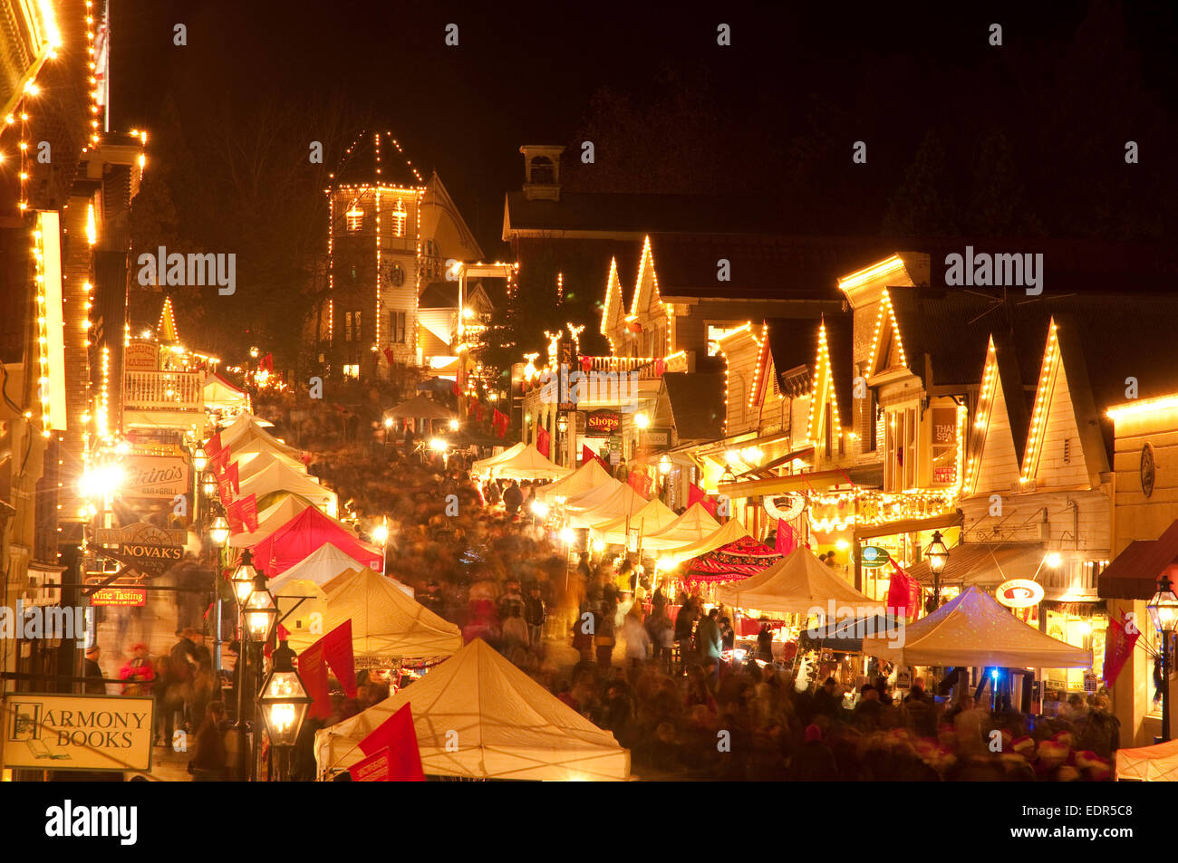 Historic Nevada City glowing at dusk with Christmas lights Stock Photo