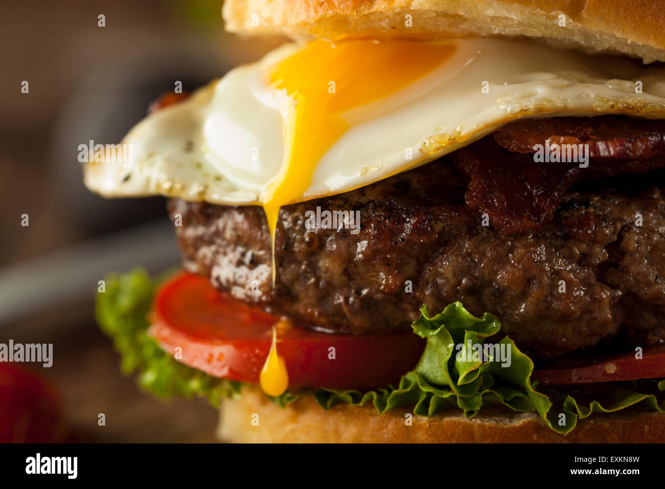 Homemmade Bacon Hamburger with Egg Lettuce and Tomato Stock Photo - Alamy