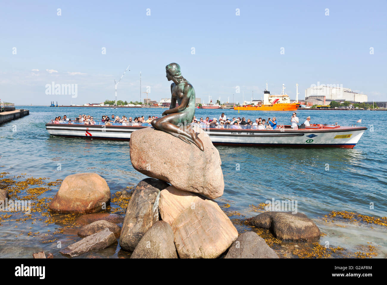 A canal tour cruise boat on a sightseeing tour at the Little Mermaid in ...