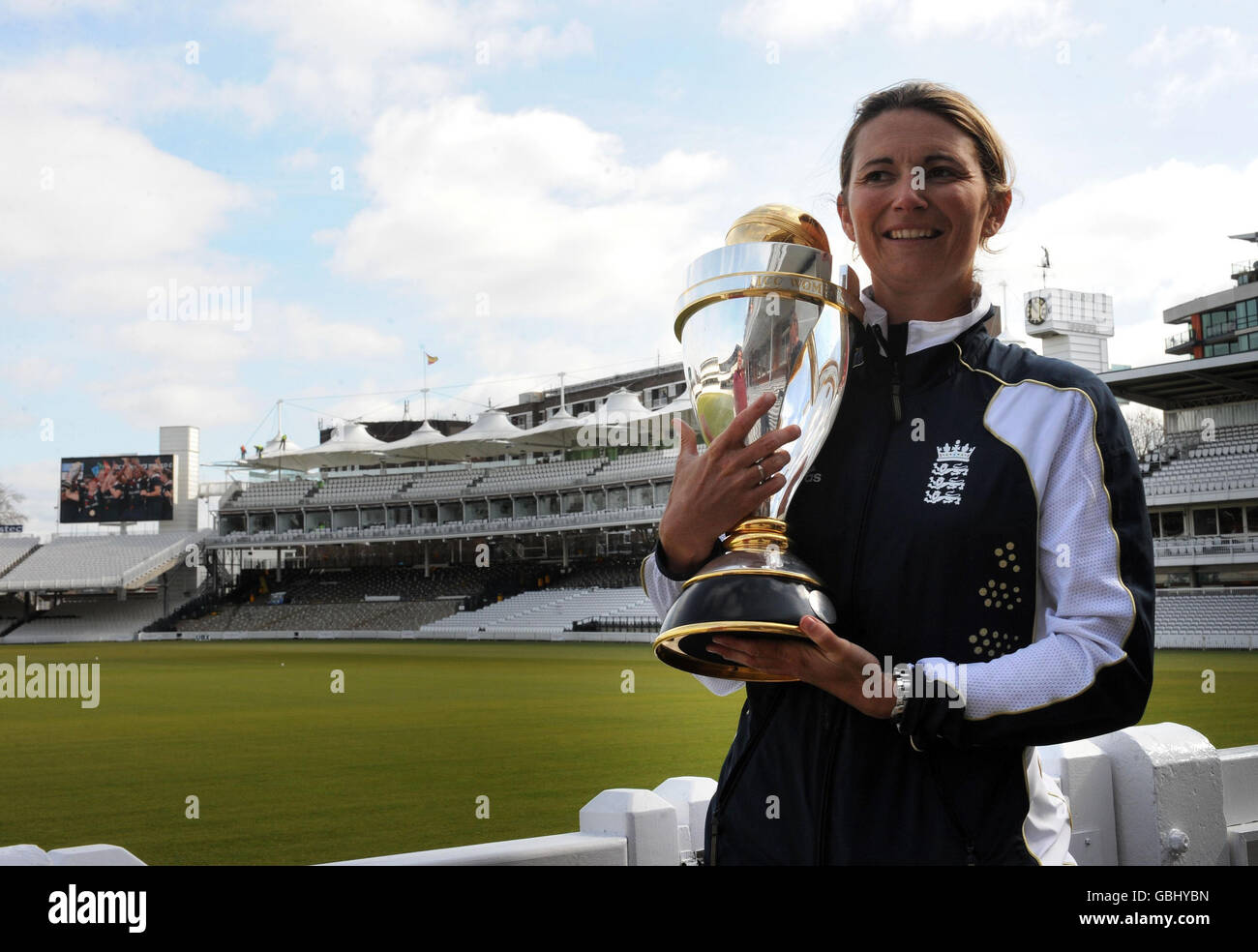 England Womens' cricket captain Charlotte Edwards holds the trophy