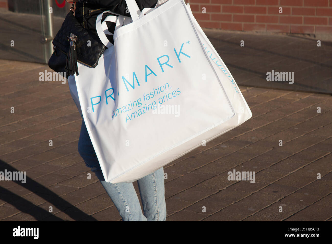 Shoppers with Primark reusable bags of store purchases at Houndshill ...