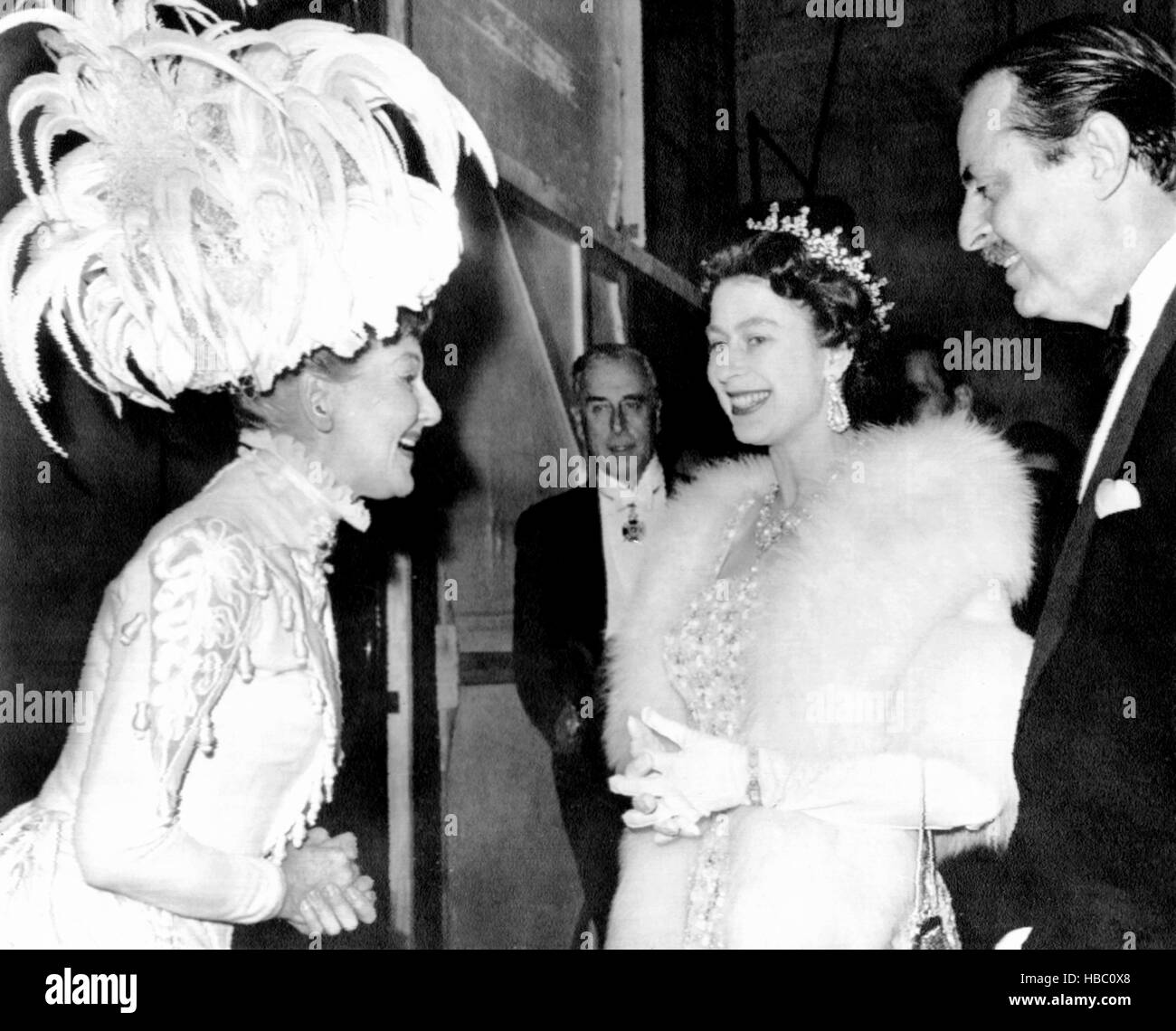 From left, Mary Martin, Queen Elizabeth II, producer David Merrick, at ...