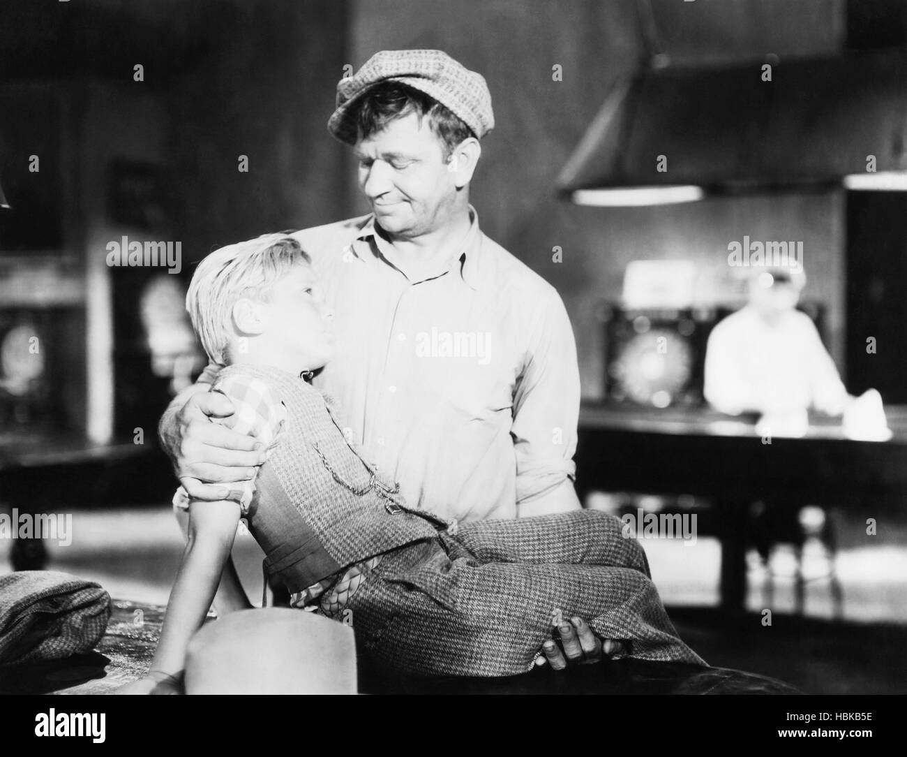 THE CHAMP, Jackie Cooper, Wallace Beery (standing), 1931 Stock Photo ...