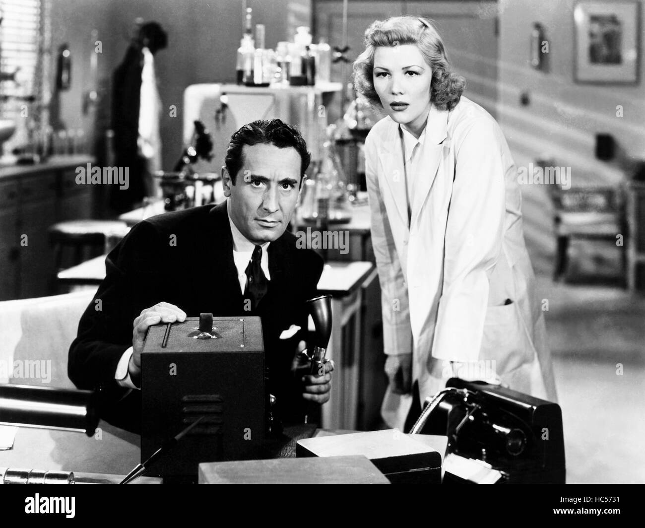 THE SHADOW, from left, Victor Jory, Veda Ann Borg, 1940 Stock Photo - Alamy
