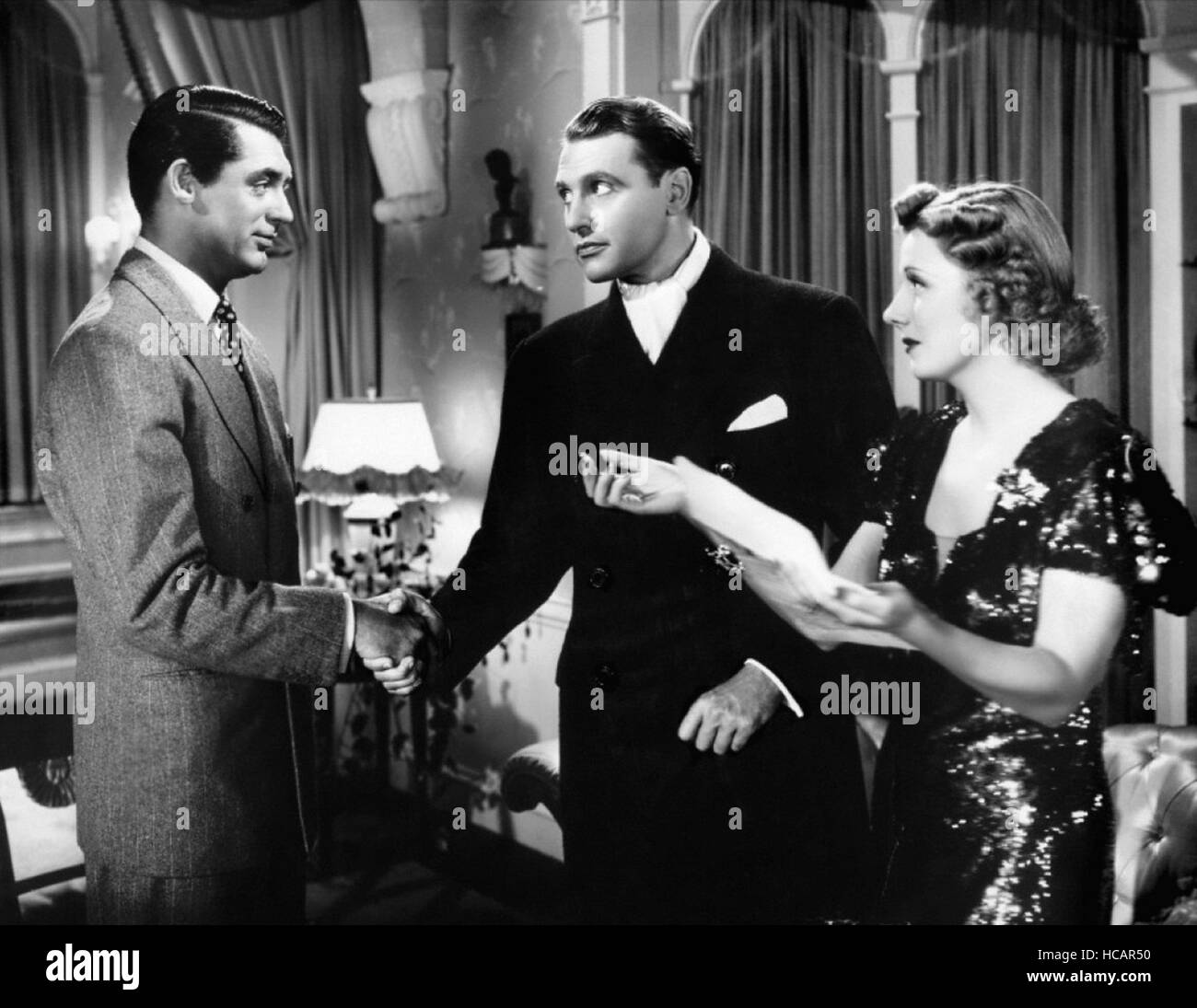 THE AWFUL TRUTH, from left: Cary Grant, Ralph Bellamy, Irene Dunne ...