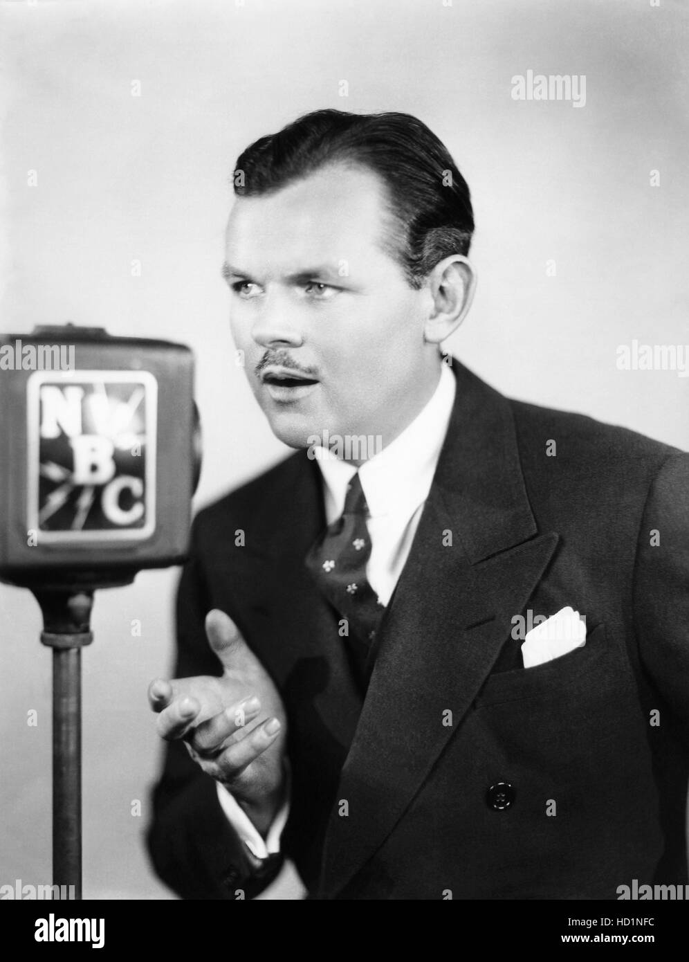 Opera singer Lawrence Tibbett at the NBC microphone, ca. 1930s Stock ...