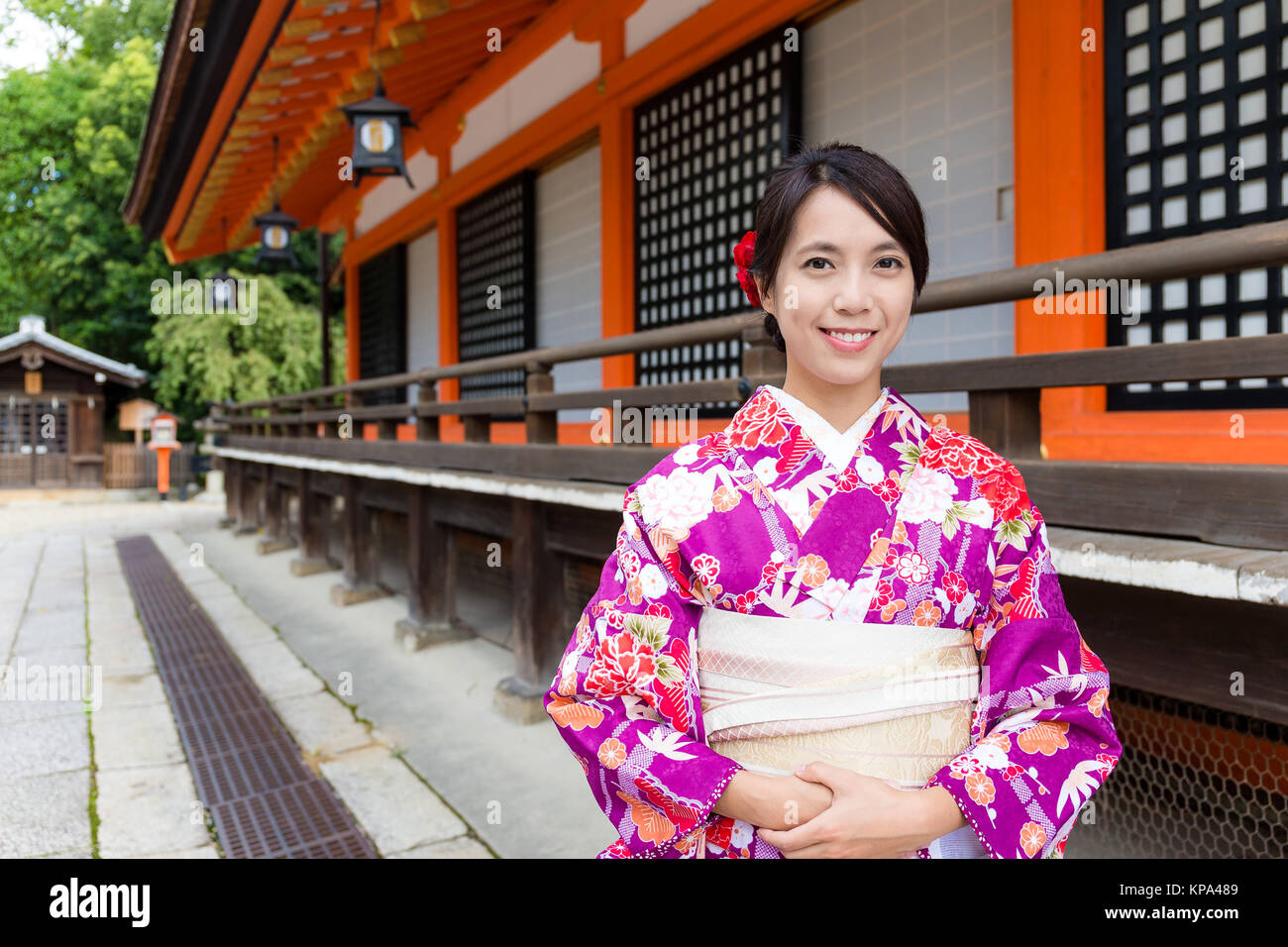 Japanese Woman with kimono dress at traditional temple Stock Photo - Alamy
