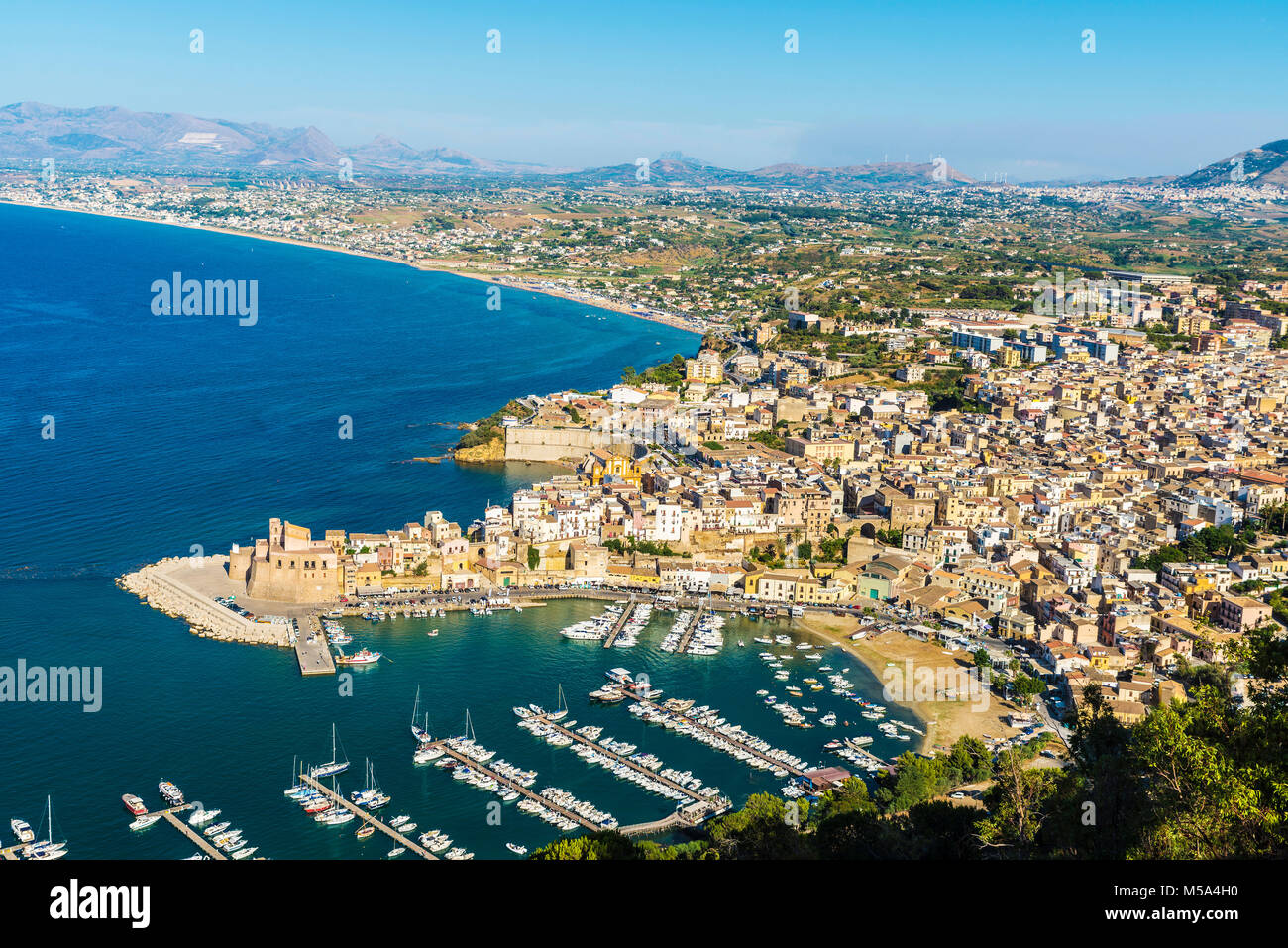 Overview of Castellammare del Golfo with its marina and its medieval ...