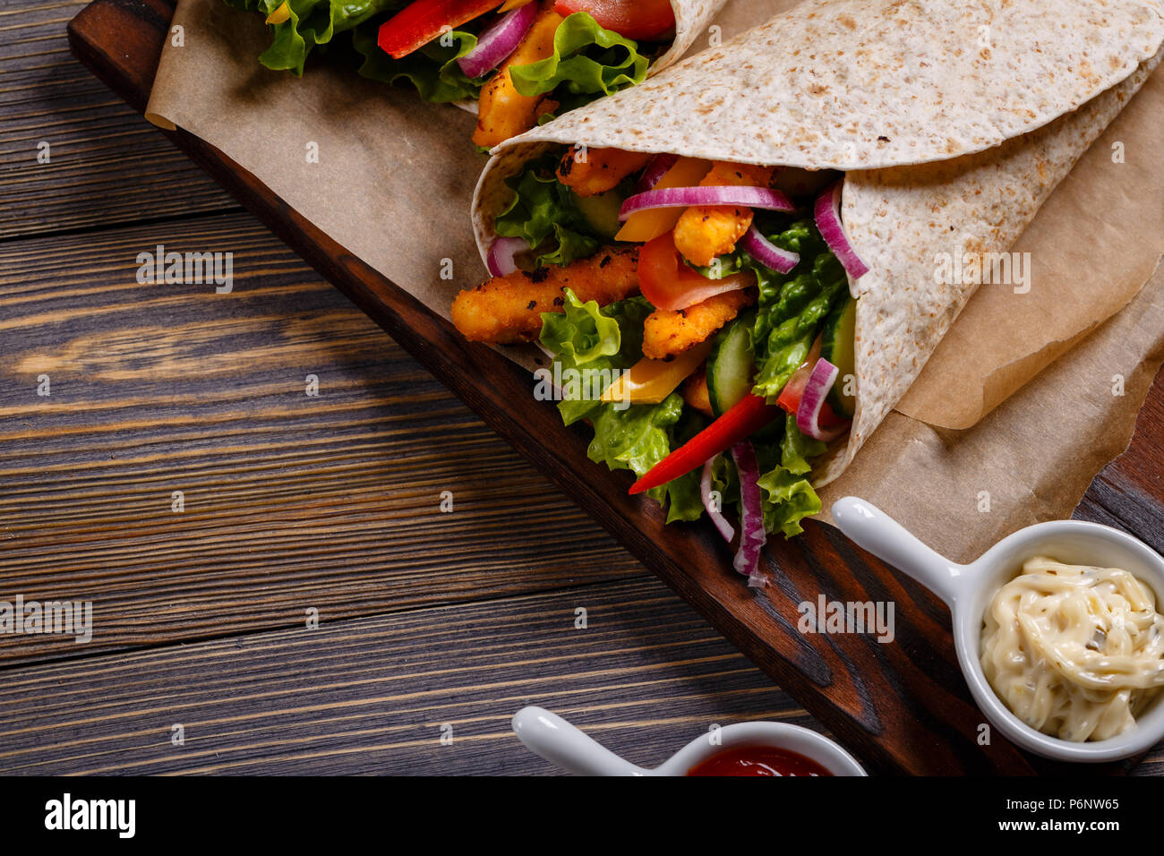 Mexican special: Tortilla with chicken and vegetables Stock Photo - Alamy