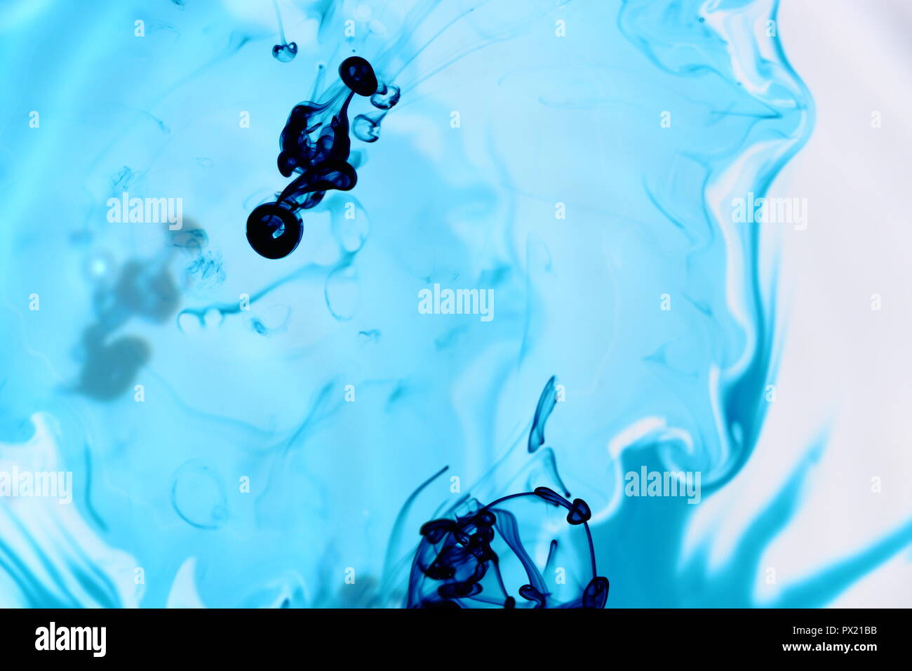 Naturally Flowing Blue Food Dye in Water Stock Photo - Alamy
