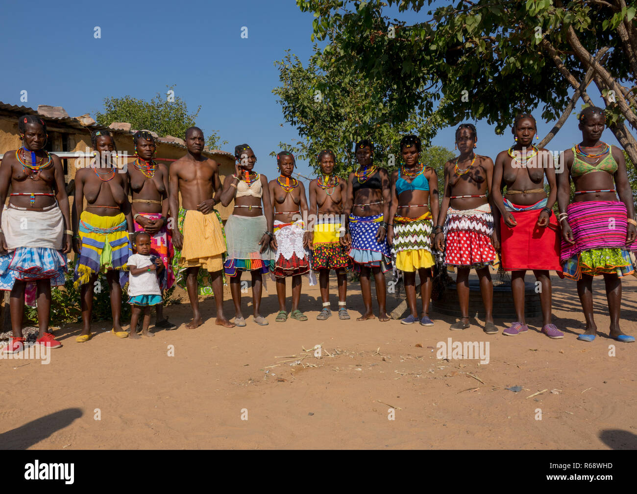 Mudimba Tribe Relatives With Their Traditional Outfit In Their Village Cunene Province Cahama 