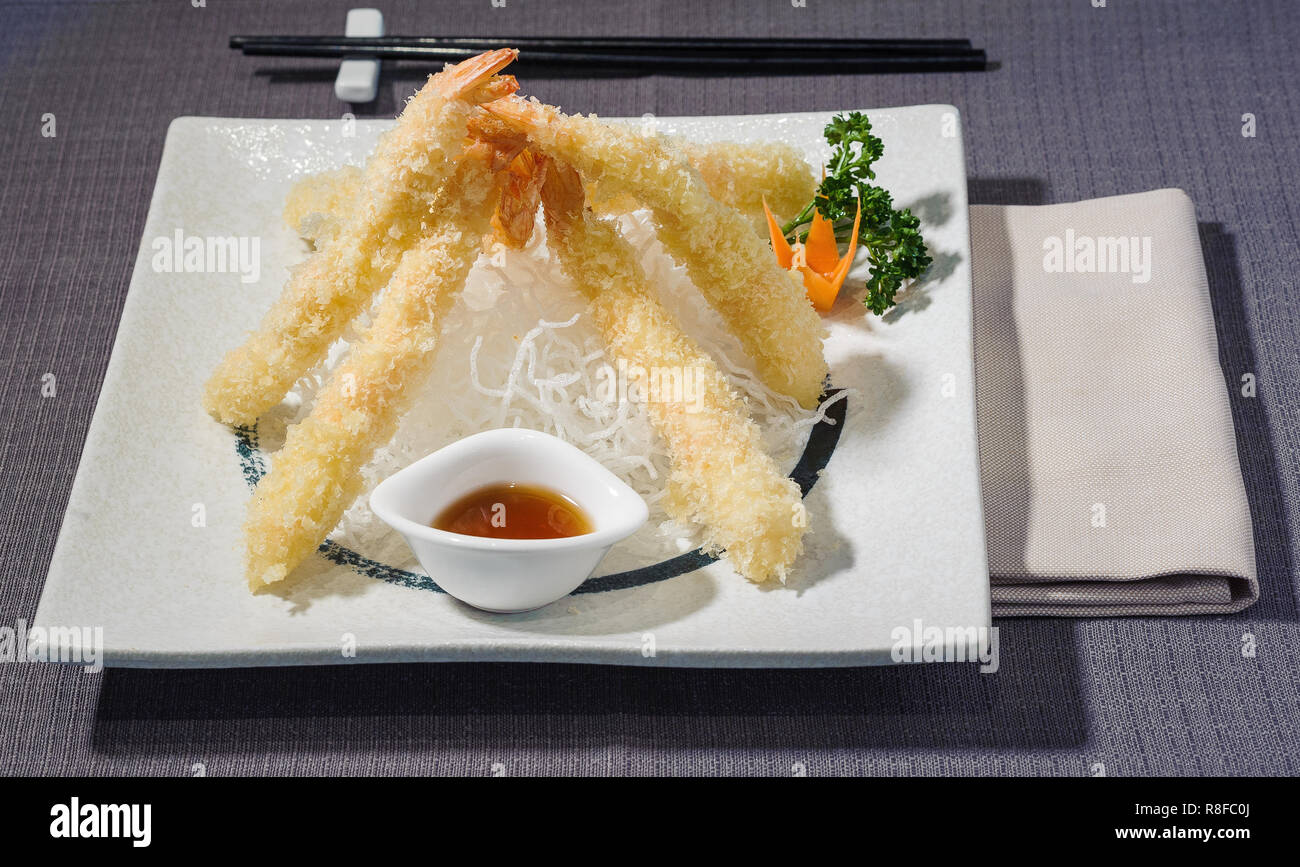 shrimp tempura on daikon julienne, japanese typical food with tamari ...