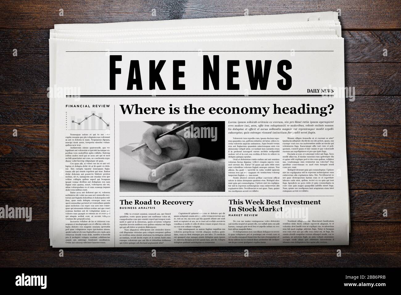 A newspaper showing 'Fake News' as headline Stock Photo - Alamy