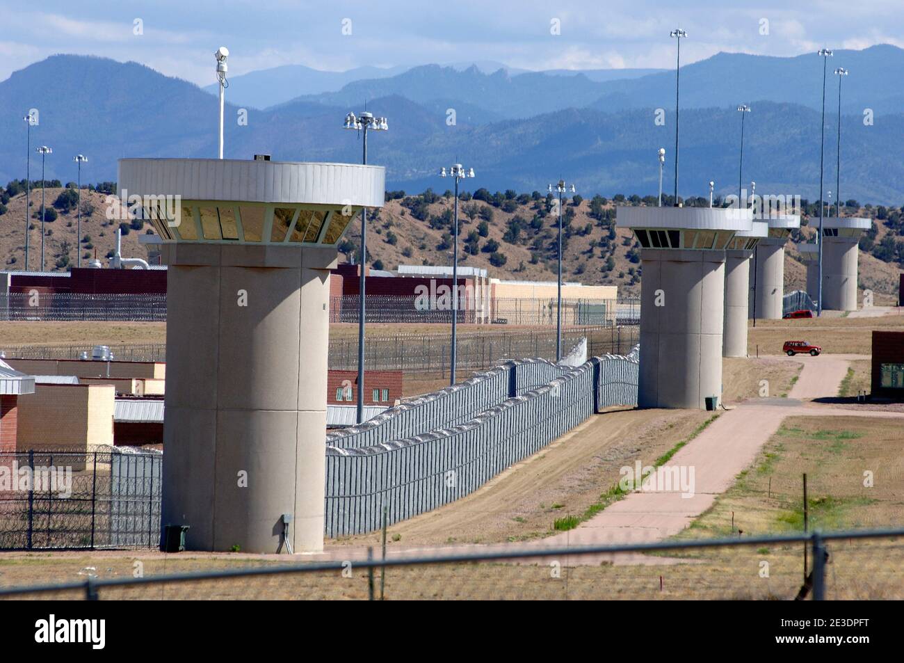 Guard towers surround the federal penitentiary facility known as