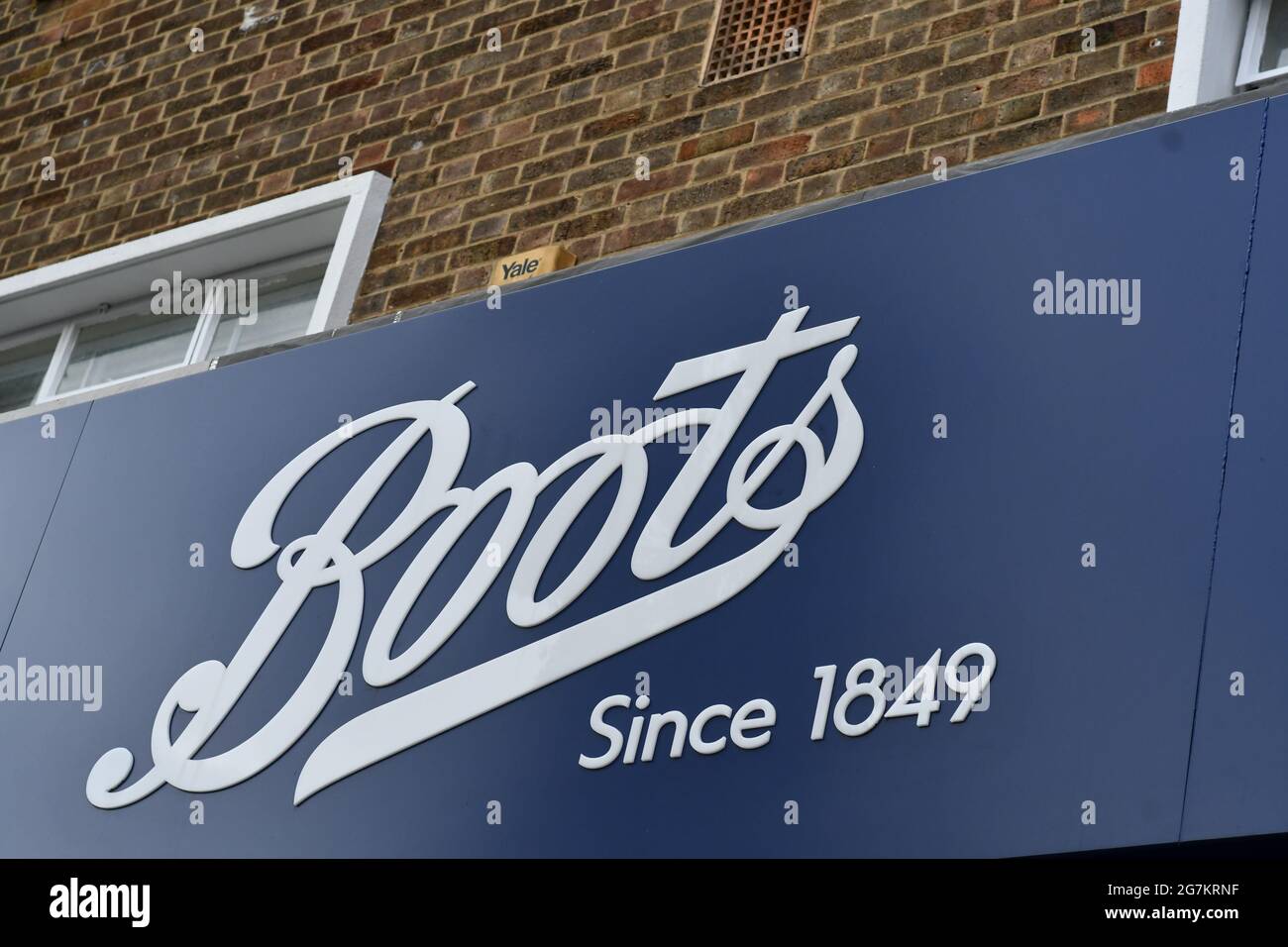 Boots the chemist advertising sign outside one of its retail stores in ...