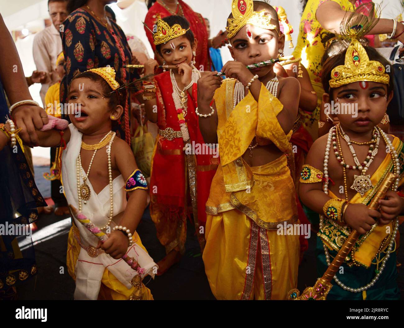 Children dressed as Lord Krishna participate in a dress competition ...