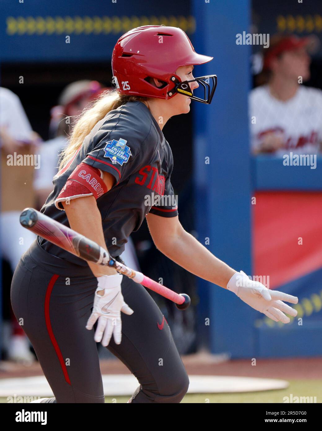 Stanford's Taylor Gindlesperger drops her bat after hitting a double ...