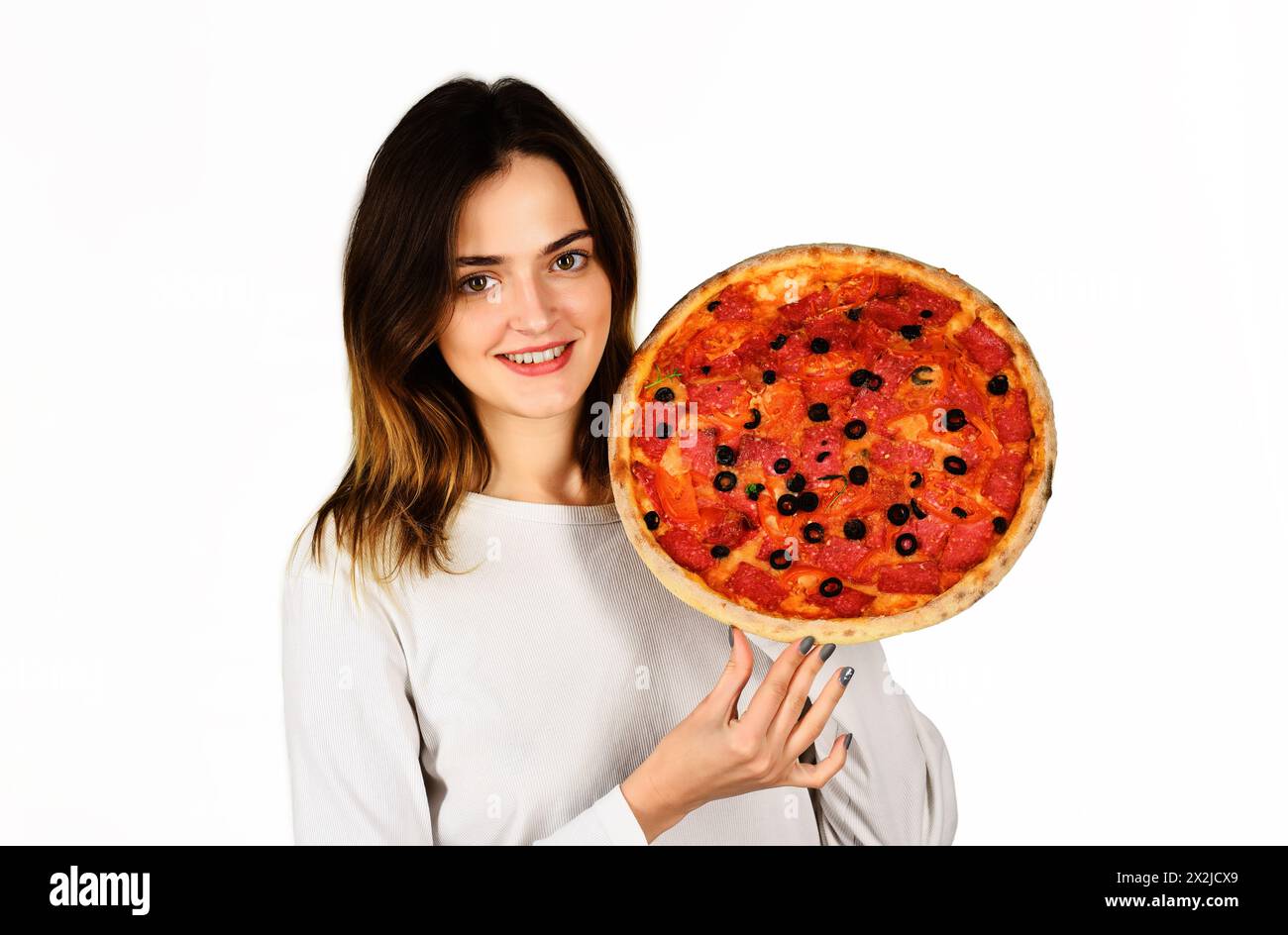 Pizza. Smiling woman with delicious pizza in hands. Lunch or dinner ...