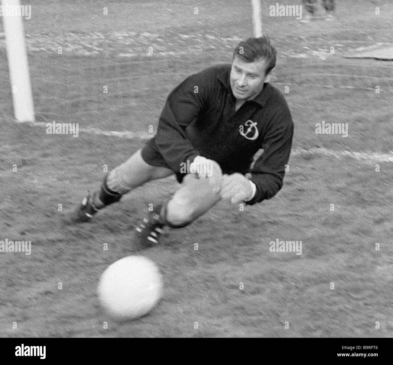 Goalie of the U S S R national team Lev Yashin catching football during ...